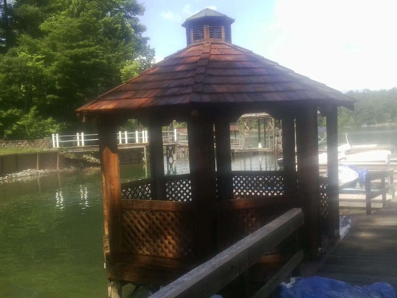Cedar shake gazebo roof rebuilt on a lake dock in Mc Dermitt